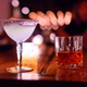 Two cocktails on a wooden bar